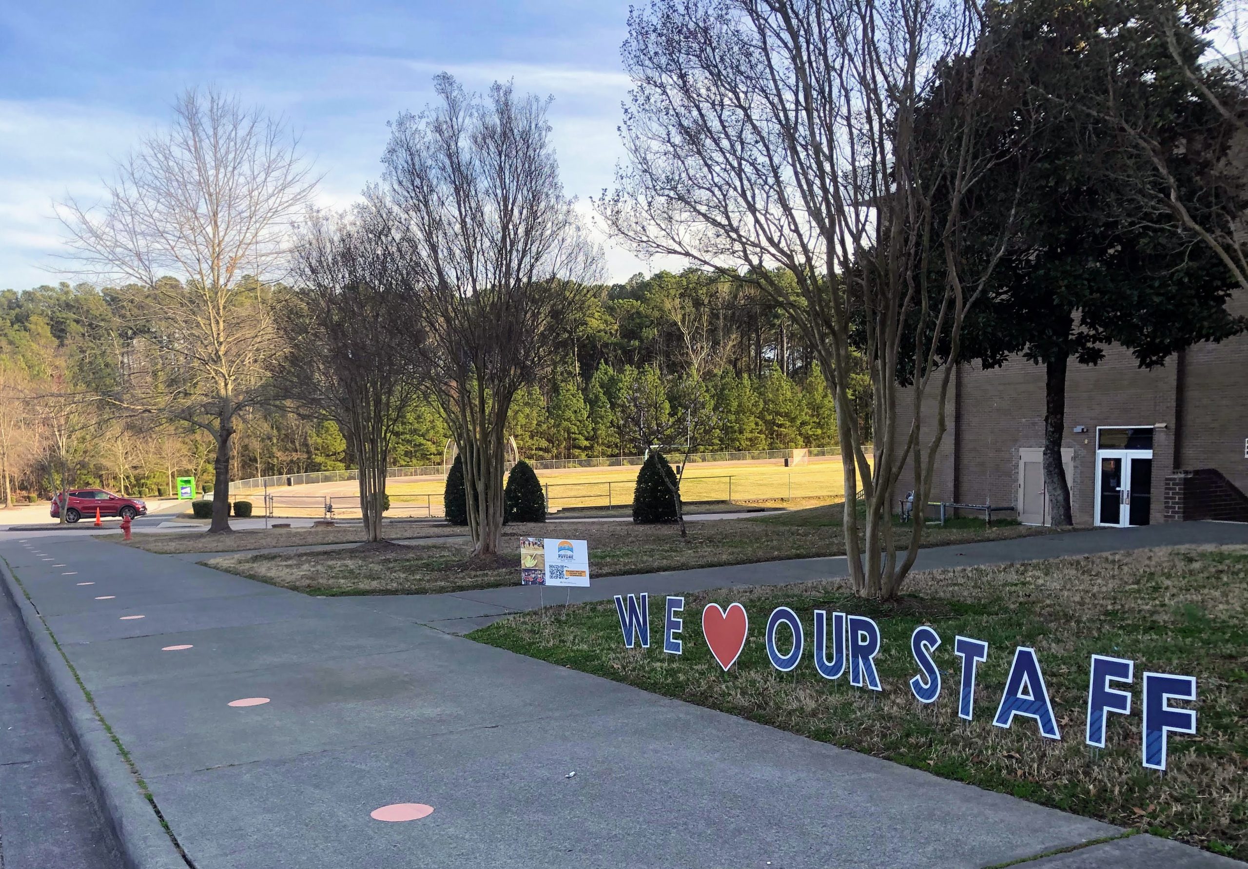 Rogers-Herr Middle School displays sign saying "We love our staff"