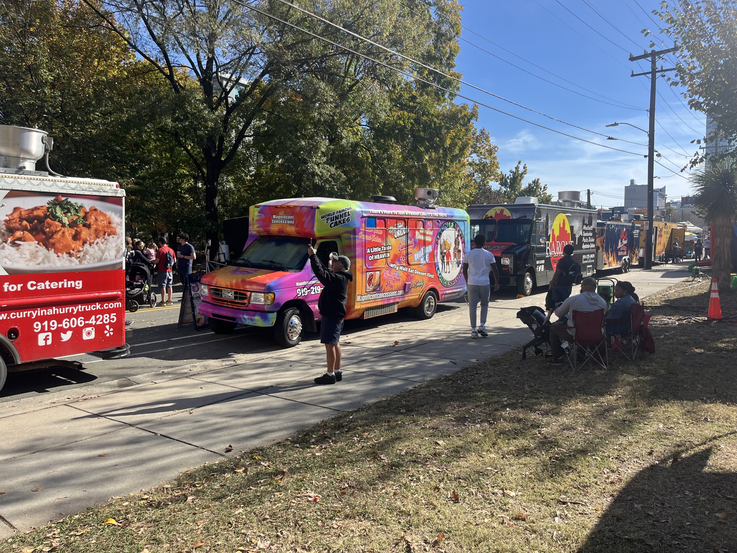 A row of food trucks sit in the street at Durham Central Park on Nov. 3, 2024. Over 36 trucks participated in this year’s rodeo.